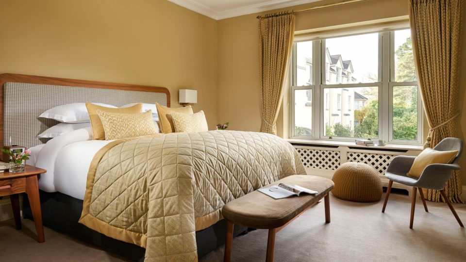 Signature Suite in Sheen Falls Lodge, view of bedroom, furniture and window