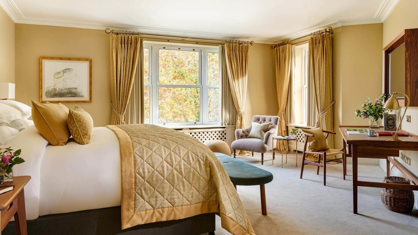 Falls View Suite in Sheen Falls Lodge with gold furnishings