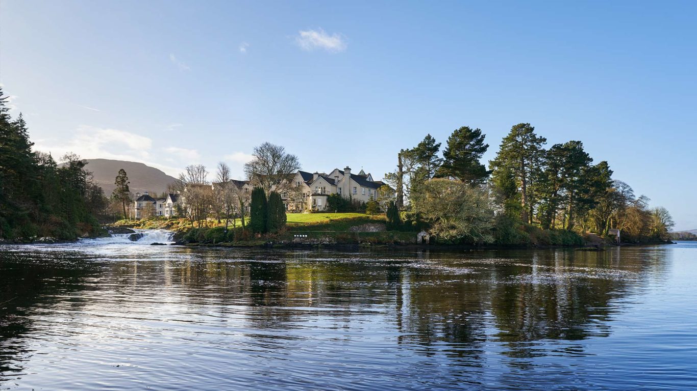 View from the water of Sheen Falls Lodge