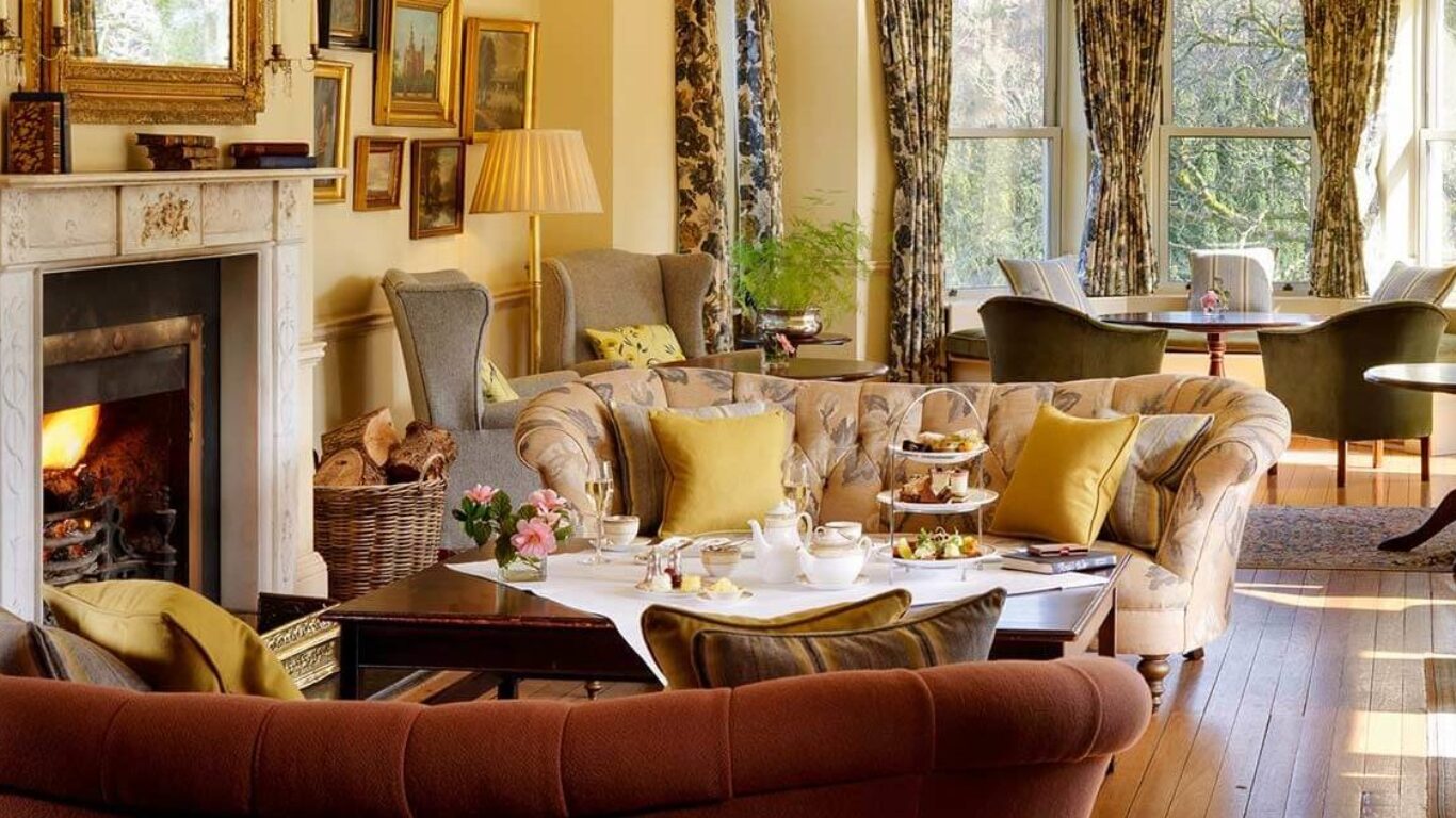 Bright lounge with furniture in Sheen Falls Lodge