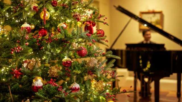 Grand piano and Christmas tree in Sheen Lounge