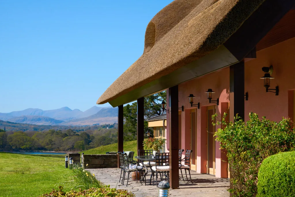 Relax on the scenic patio with mountain views, lush gardens, and elegant outdoor seating. Perfect for a peaceful retreat.